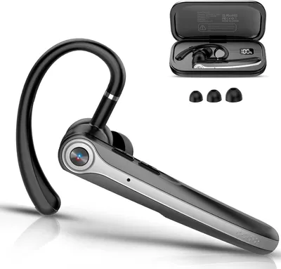 A black and silver Bluetooth headset with its charging case and ear tips, displayed on a white background.