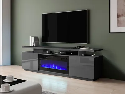A modern living room with a TV stand featuring an electric fireplace.
