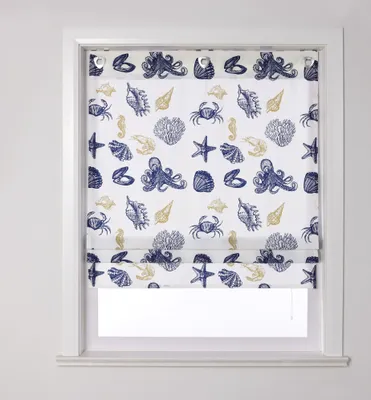 A roman blind with a nautical print is shown hanging in a window frame.