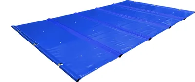 A blue pool cover laid out on a white background.