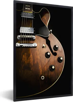 Produktbild von MuchoWow® Gerahmtes Poster Eine E-Gitarre aus Holz 60x90 cm - Poster mit Schwarzem Bilderrahmen Wandposter Rahmen Foto Bilder - Kunst