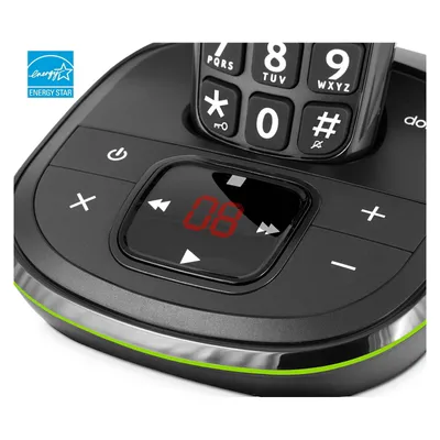 Close-up of a cordless phone base with a digital display and buttons.