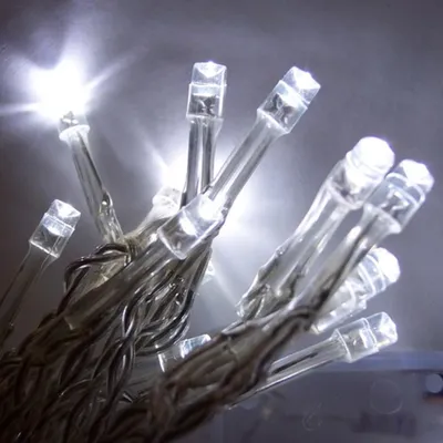 A close-up view of a string of white LED lights.