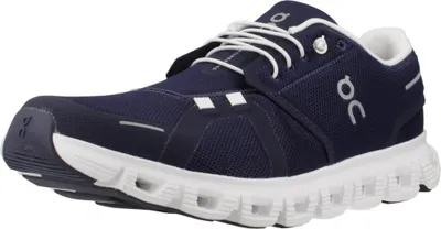 A studio shot of a single running shoe.