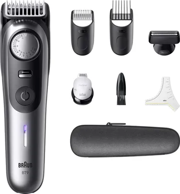 A collection of grooming tools and accessories, including a beard trimmer, various attachments, a cleaning brush, a measuring guide, and a storage case, all arranged on a white background.