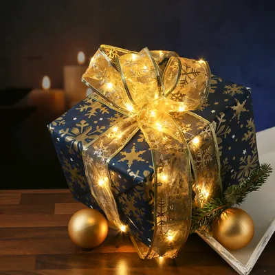 Produktbild von LED Seidenband Lichterkette - Geschenkband - Schneeflockenmotiv - 30 LED - L: 2,7m - Batterie - gold