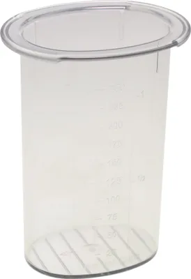 A clear plastic measuring cup with markings on the side.