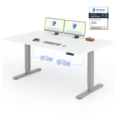 A white adjustable standing desk with dual monitors, keyboard, mouse, and controller.