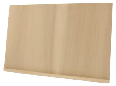A light brown wooden cutting board with a small lip at the bottom, shown at an angle against a white background.