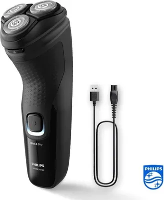 A black electric shaver and its charging cable are displayed against a white background.