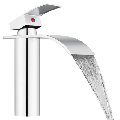 A modern chrome waterfall faucet with water flowing.
