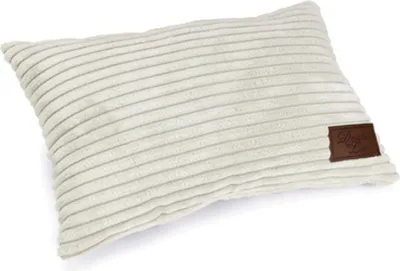 A rectangular pillow with ribbed texture and a brown leather tag on the right side.