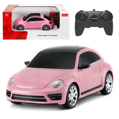 A pink remote-controlled Volkswagen Beetle car and its remote control are displayed against a white background, with the car's packaging also visible.