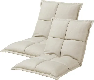 Two beige floor chairs are shown against a white background.