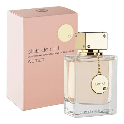A perfume bottle and its box are displayed on a white background.
