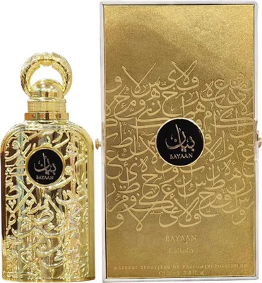 A gold-colored perfume bottle and its matching box are displayed against a white background.