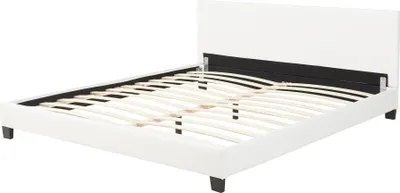 A white upholstered bed frame with a slatted base, shown from a diagonal angle.