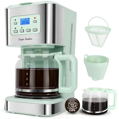 A mint green and silver coffee maker with a glass carafe filled with coffee, along with separate coffee filters and an empty carafe, displayed against a white background.