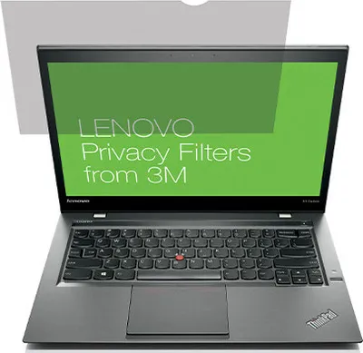A Lenovo laptop with a privacy filter applied to the screen.