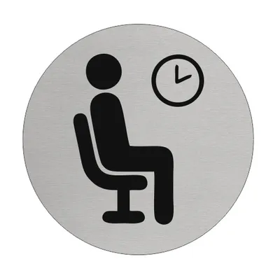Produktbild von CombiCraft Aluminium Türschild "Wartezimmer" mit sitzendem Piktogramm und Hintergrunduhr, Ø75 mm Durchmesser und doppelseitigem Klebeband