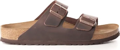 A side view of a brown Birkenstock Arizona sandal.