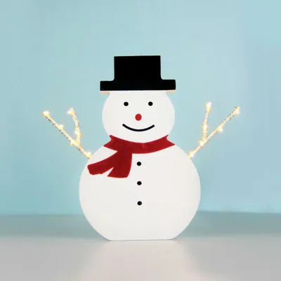 Productafbeelding van ACA Verlichte sneeuwpop van hout, met 12 mini-LED's, op batterijen (2 AA), beschermingsklasse IP20, 17 x 2,3 x 16 cm, X05121107