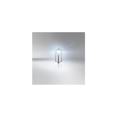 A single light bulb is shown on a reflective surface with a gradient background.