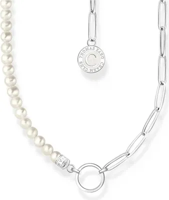 A pearl necklace with a silver chain and a charm.
