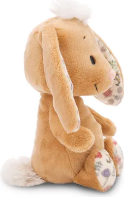 A side view of a plush toy bunny.
