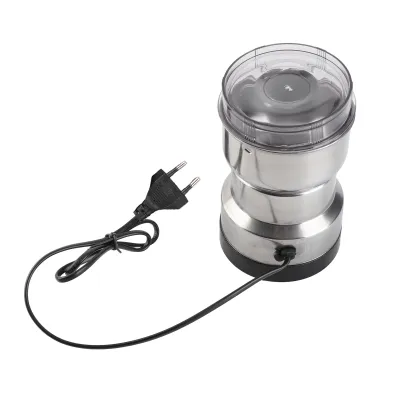 A stainless steel electric grinder with a transparent lid and a black power cord with a plug, shown on a white background.