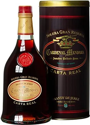 A bottle of Cardenal Mendoza brandy and its cylindrical tin packaging are displayed against a white background.