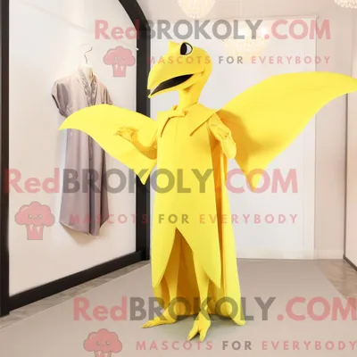 Obrázek produktu pro Citronově REDBROKOLY žlutá postava maskota pterodaktyla oblečená ve večerních šatech a kapesnících