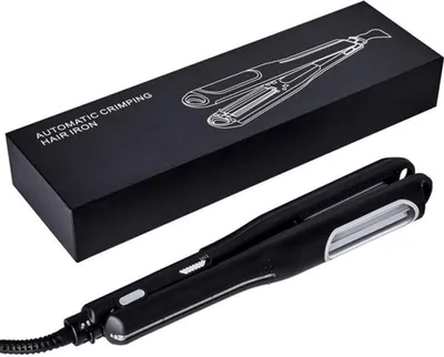 A black automatic crimping hair iron is shown next to its black packaging box, which features a line drawing of the product and text.