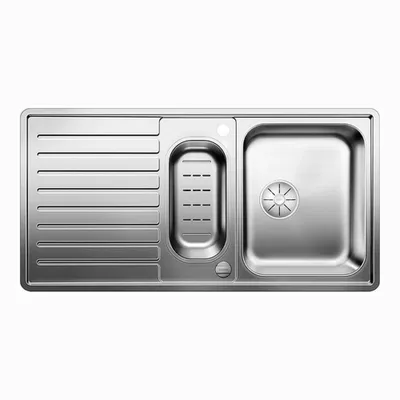 A stainless steel kitchen sink with multiple compartments and a drainboard.