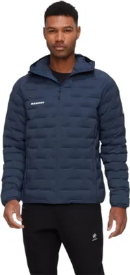 A man wearing a blue hooded jacket and black pants, posing for a product shot.