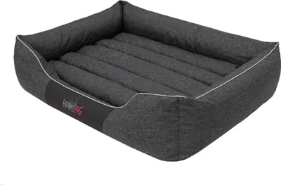 A dark gray dog bed with a white trim and a dark gray logo on the side.
