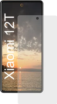 A screen protector is placed over a smartphone displaying a sunset.