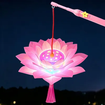 Imagen del producto de Linterna infantil, ya montada, de color rosa y con forma de loto, ideal para desfiles de linternas
