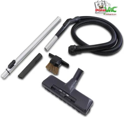 A collection of vacuum cleaner attachments and a hose are laid out on a white background.