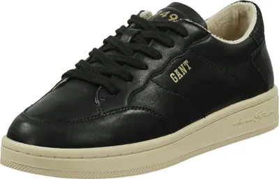 A single black sneaker is shown against a white background.