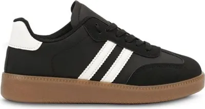 A black Adidas sneaker with white stripes and a brown sole.