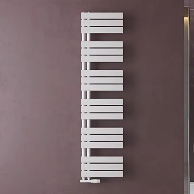 A white towel radiator mounted on a purple wall.