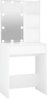 A white vanity table with a mirror and shelves.