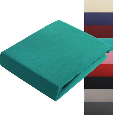 A teal-colored fitted sheet is shown folded on a white background. To the right, a vertical strip displays swatches of various colors.