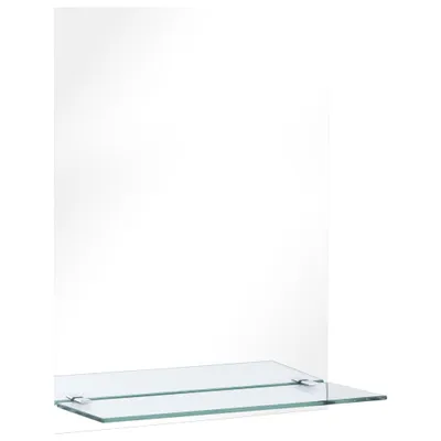 A clear shot of a glass shelf attached to a mirror.