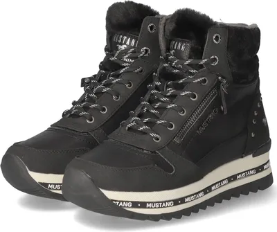 A pair of black Mustang women's ankle boots with a platform sole, displayed against a white background.