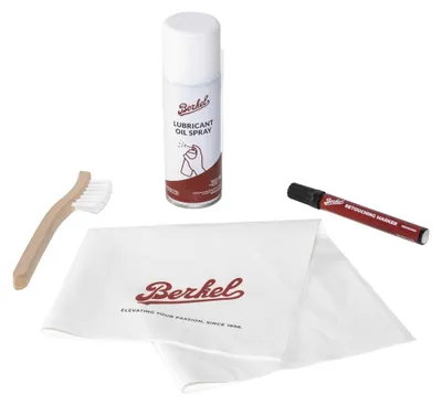 A collection of cleaning and maintenance items for a Berkel product.