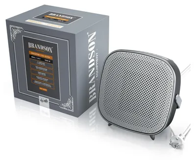 A product box and a heater are shown in a studio setting with a white background.