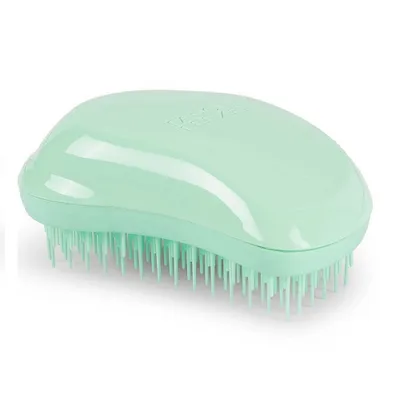 A mint green Tangle Teezer hairbrush is shown against a white background.