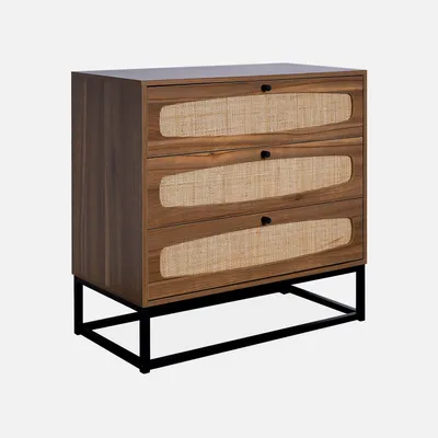 A wooden dresser with rattan drawer fronts and black metal legs, shown against a white background.